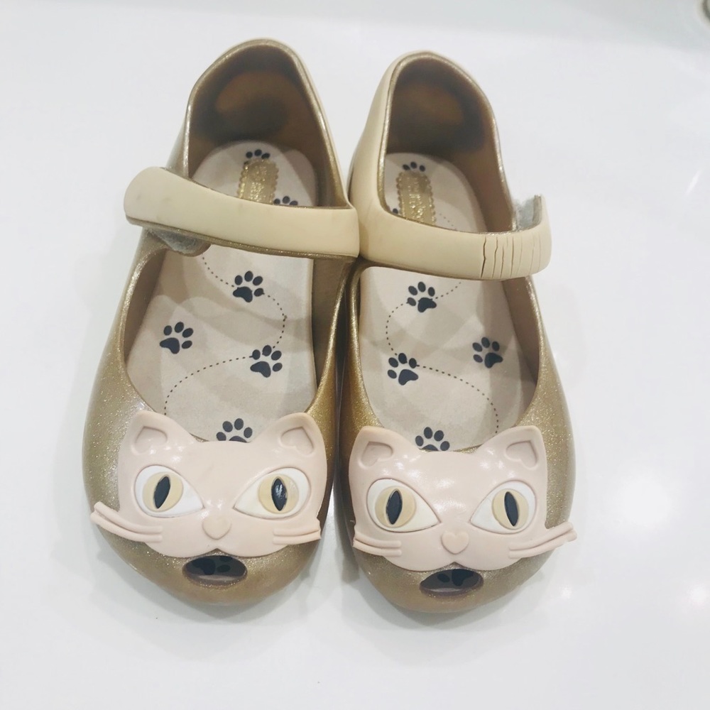 Mini Melissa Cat face shoes in gold color size 10
